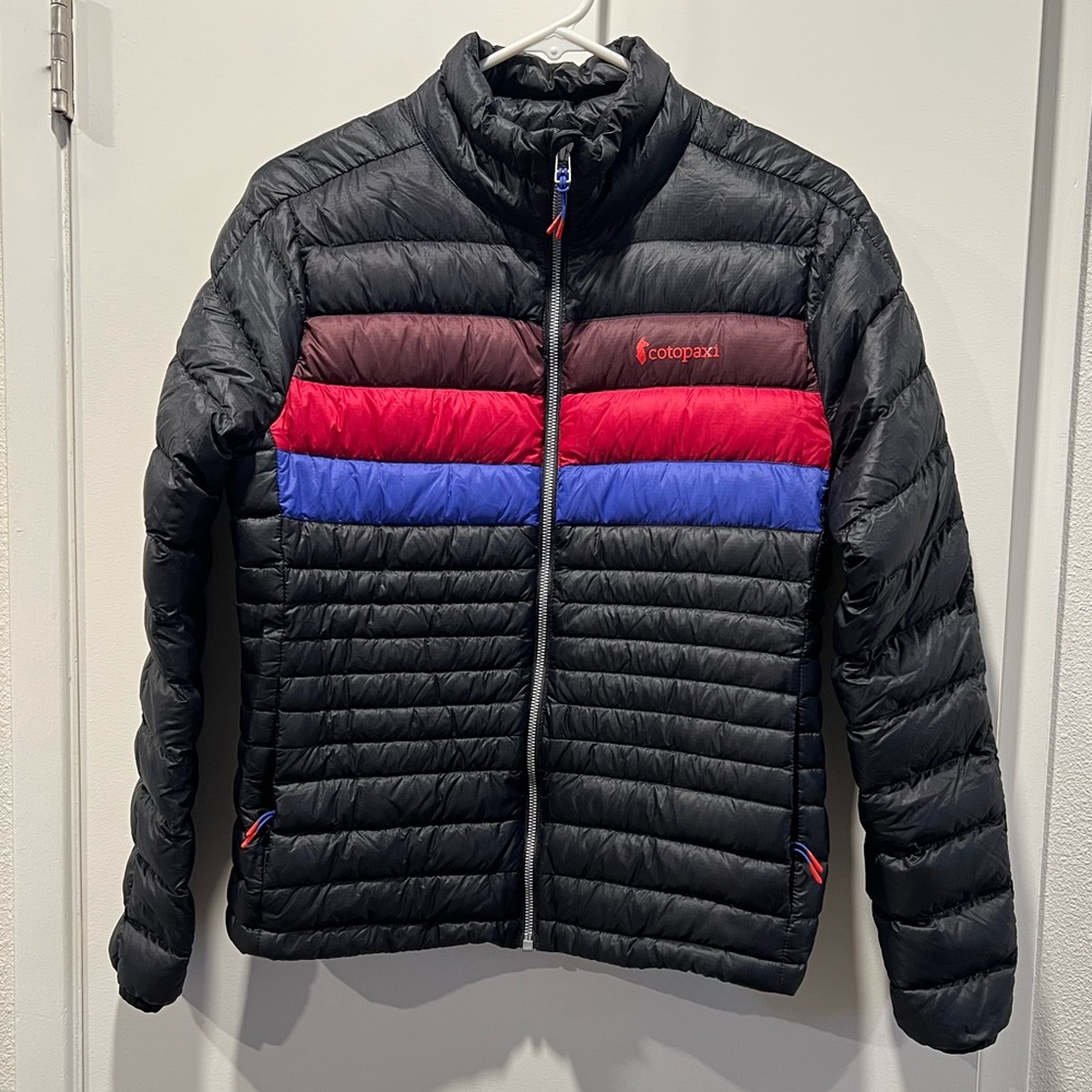Cotopaxi Woman’s Down Fuego Black Jacket with Red & Blue Stripes